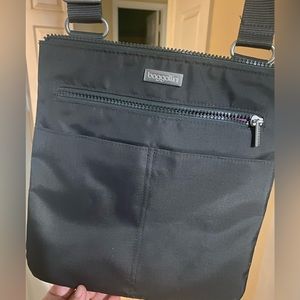 Baggallini crossover bag bought but never used.